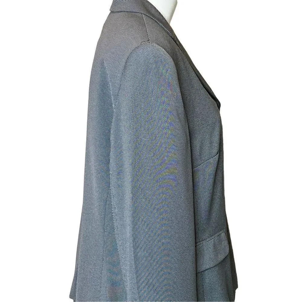 Travis Ayer’s vintage black and white textured skirt suit size 14
